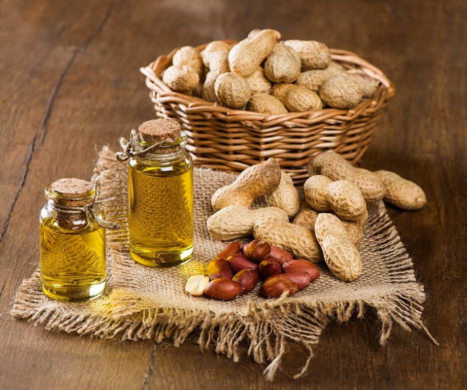 peanuts and peanut oil jars on the table