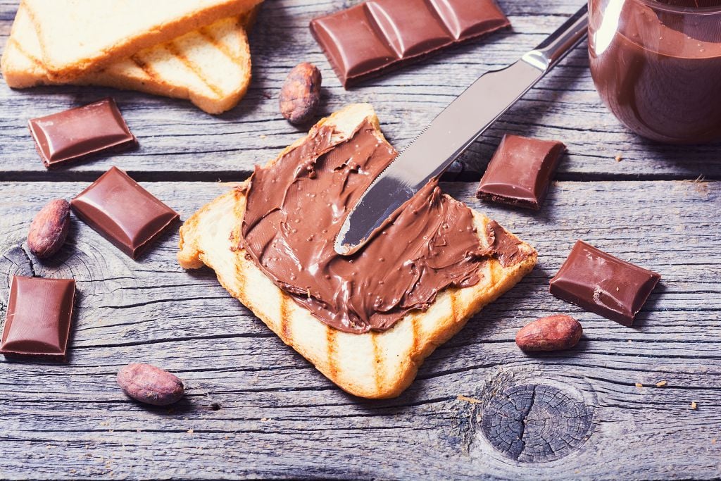 bread with melt nutella and a knife