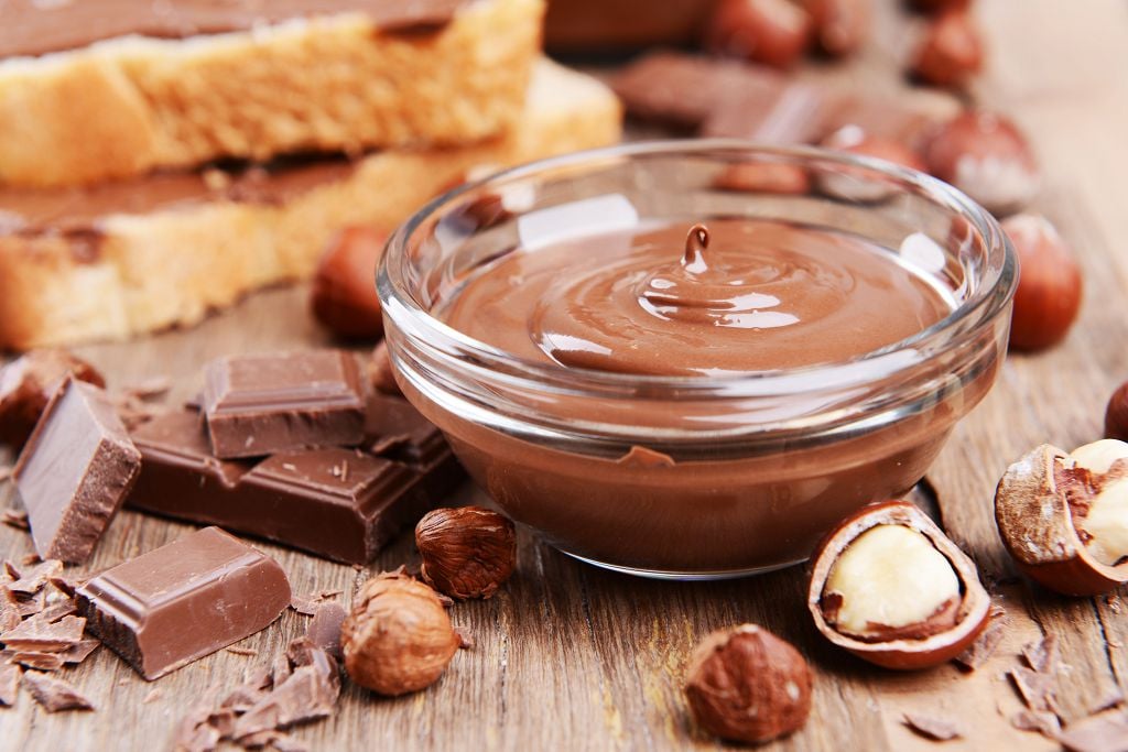 chocolate and a bowl of melt nutella on the table