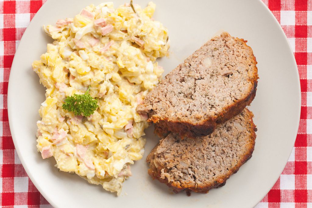 Potato Salad and slices of black bread on the plate