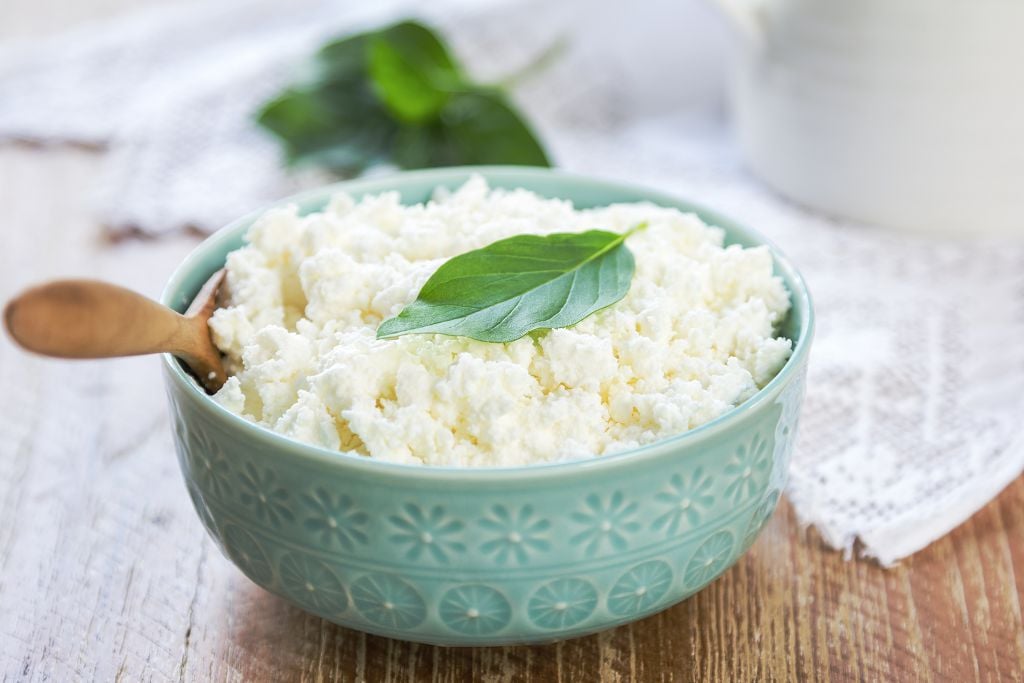 A bowl of Ricotta Cheese and a spoon