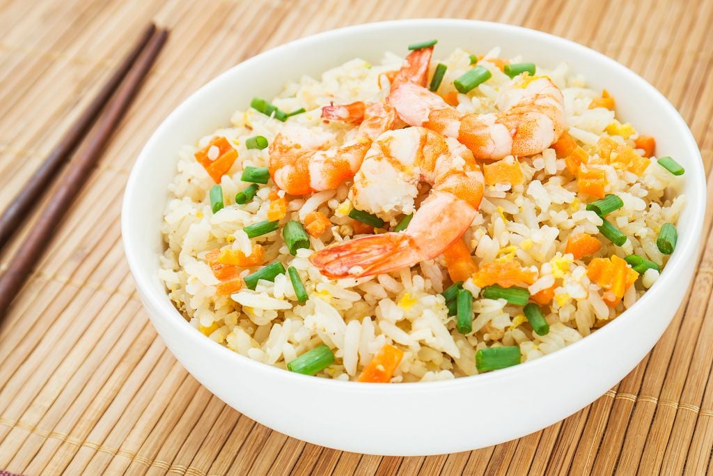 Divide the brown rice and shrimp mixture among four serving bowls.