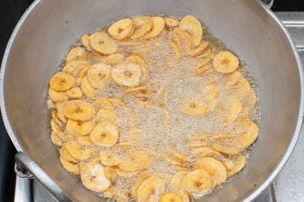 frying pan with slices of banana