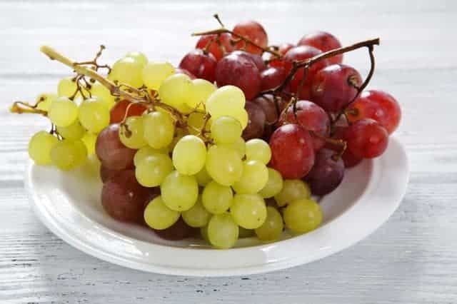 a plate of Grape on the table