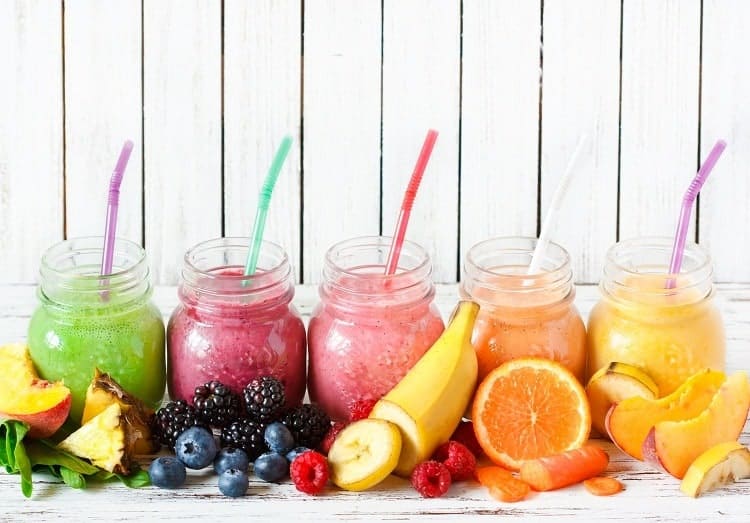 Bottles of Smoothie Creamy and fruits on the table