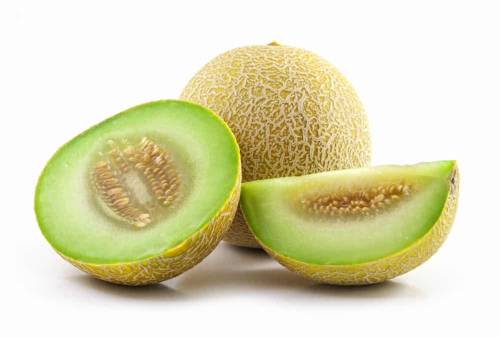 honeydew melons and slices of honeydew melons