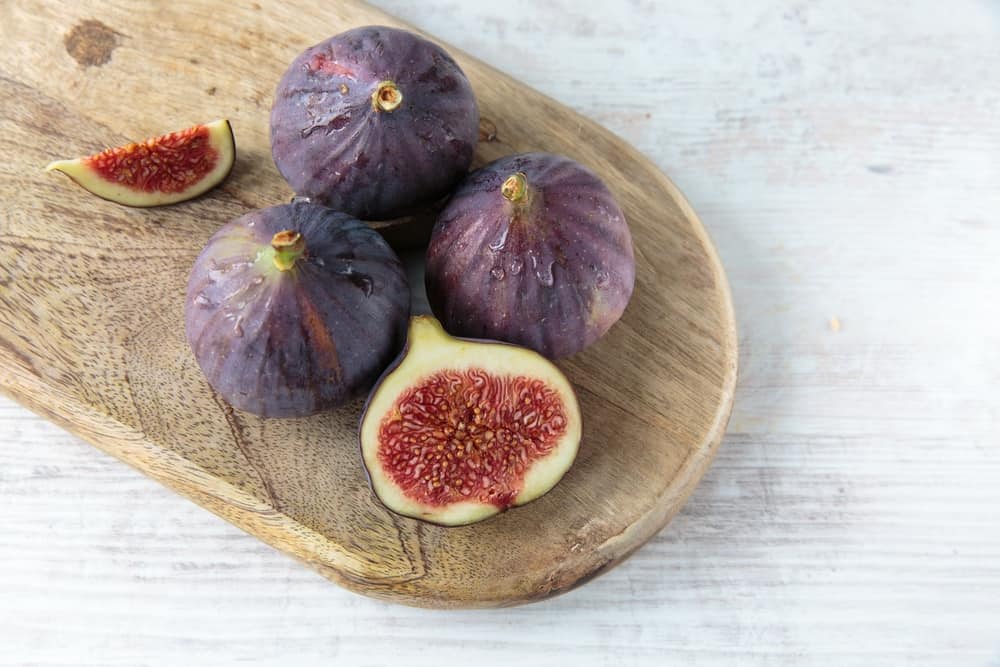 Slices of Fig and Fig on the chopping board