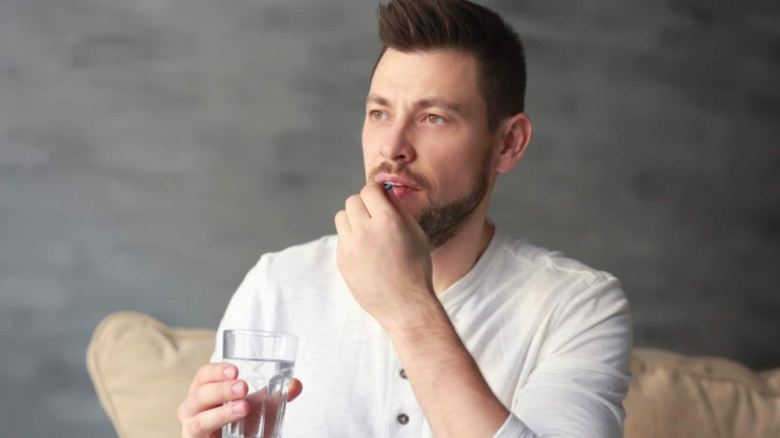 Man taking medicine