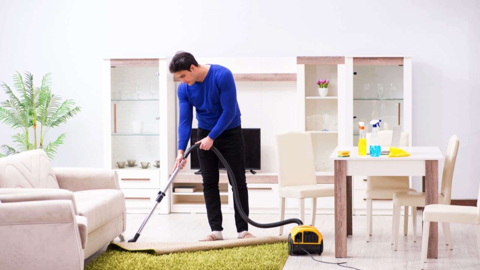Man vacuuming