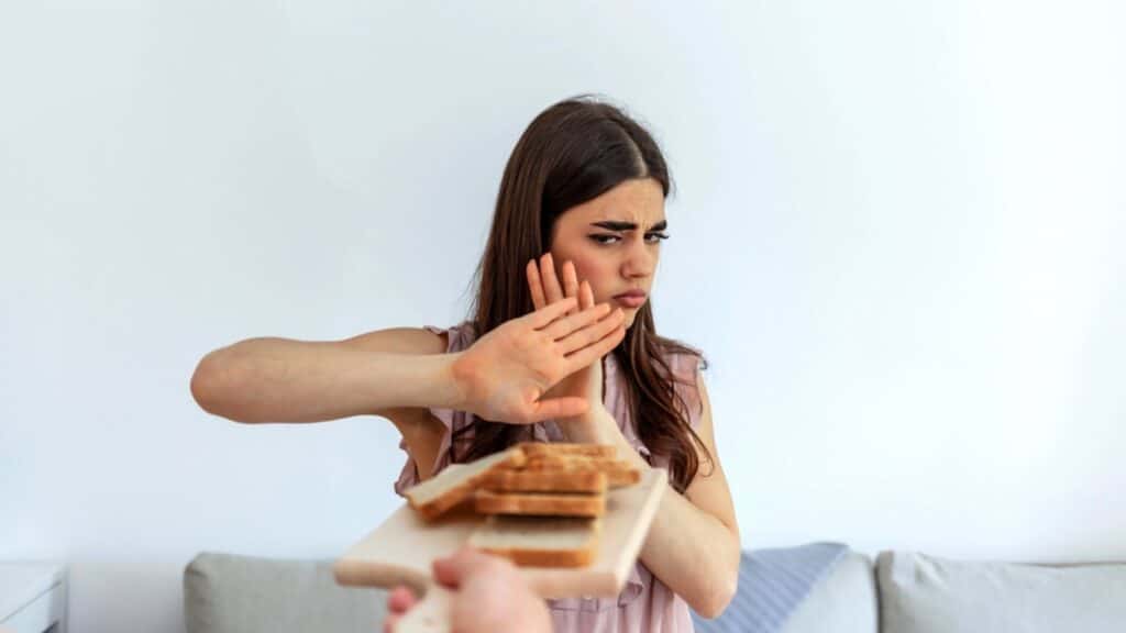 Woman saying no to junk food