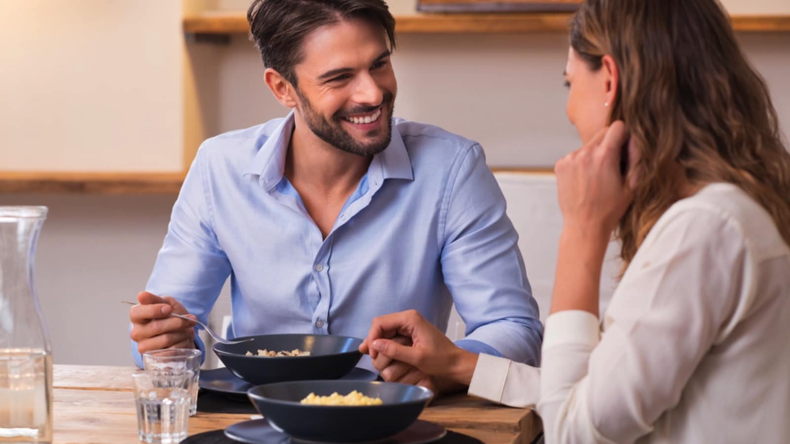 Couples eating dinner at home